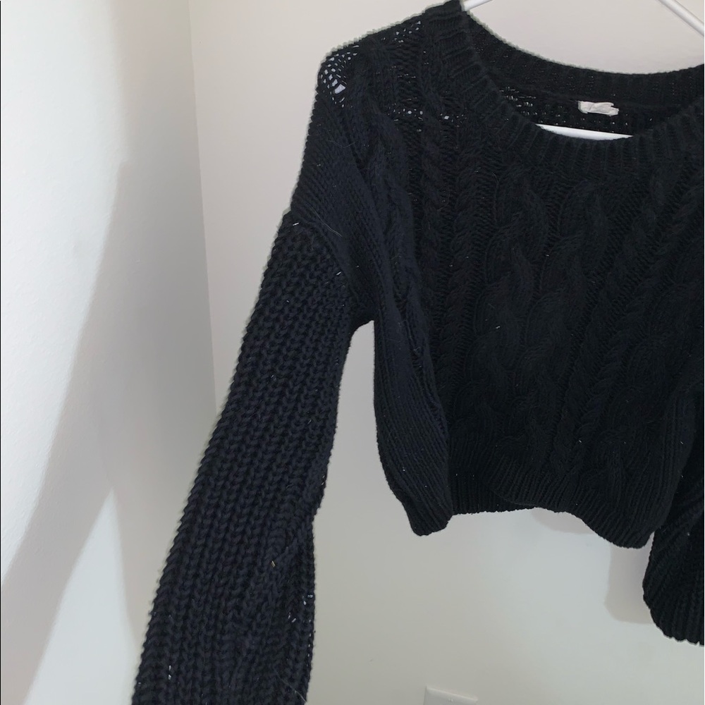 Fairly new black knit sweater in perfect condition